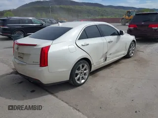 2014 Cadillac ATS Luxury RWD z VIN 1G6AB5RX6E0130600, wystawiony jako IAAI lot #42094510 z przebiegiem 122 872 mil mil oraz . Historia ofert i sprzedaży dostępna na DreamBid. Obrazek 4.