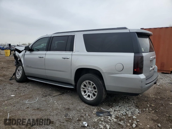 2017 GMC Yukon XL SLT with VIN 1GKS2GKC0HR368385, listed as a Copart auction lot 54260245 with 90,942 mi miles and Salvage title. Bid and sale history available at DreamBid. Image 2.