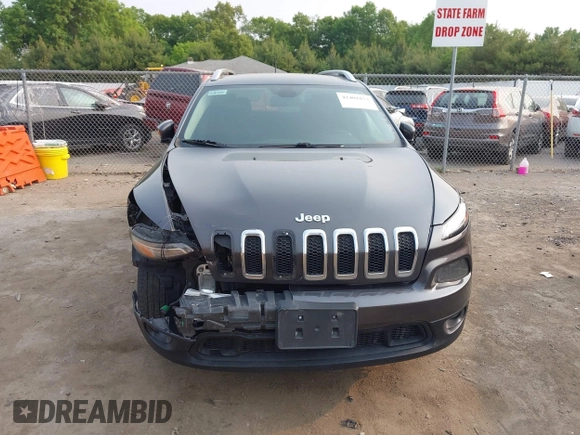 2017 Jeep Cherokee Latitude z VIN 1C4PJMCB8HW563256, wystawiony jako IAAI lot #42401873 z przebiegiem 258 934 mil mil oraz . Historia ofert i sprzedaży dostępna na DreamBid. Obrazek 13.
