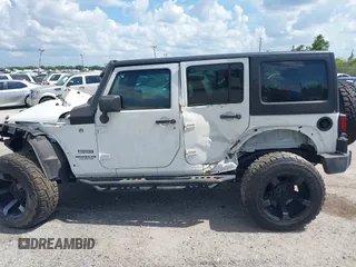 2016 Jeep Wrangler Unlimited Sport with VIN 1C4BJWDGXGL335825, listed as a IAAI auction lot 28960589 with 28,515 mi miles and . Bid and sale history available at DreamBid. Image 15.