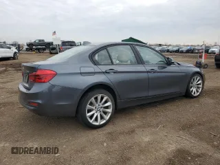2018 BMW 3 Series 320i xDrive z VIN WBA8A3C57JA491717, wystawiony jako Copart lot #49509515 z przebiegiem 57 141 mil mil oraz Szkoda całkowita • Salvage title. Historia ofert i sprzedaży dostępna na DreamBid. Obrazek 3.