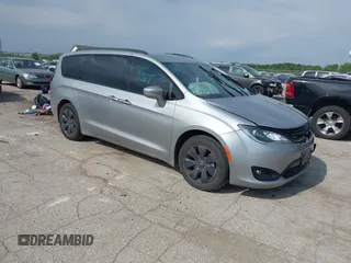 2019 Chrysler Pacifica Hybrid Touring L with VIN 2C4RC1L7XKR613958, listed as a IAAI auction lot 42219967 with 92,635 mi miles and . Bid and sale history available at DreamBid. Image 1.