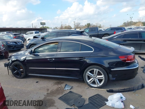 2013 Volkswagen CC Sport z VIN WVWBP7AN3DE570204, wystawiony jako IAAI lot #41478044 z przebiegiem 168 376 mil mil oraz . Historia ofert i sprzedaży dostępna na DreamBid. Obrazek 14.
