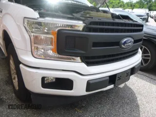 2019 Ford F-150 XL with VIN 1FTEX1CP2KKD65352, listed as a IAAI auction lot 42786007 with 110,186 mi miles and . Bid and sale history available at DreamBid. Image 16.