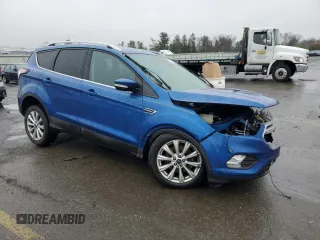 2017 Ford Escape Titanium with VIN 1FMCU9JD6HUD47758, listed as a Copart auction lot 50354405 with 83,243 mi miles and Salvage Title. Bid and sale history available at carsss.com. Image 4.