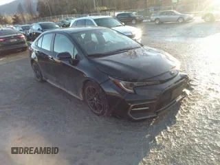 2021 Toyota Corolla SE with VIN 5YFS4MCE9MP090031, listed as a IAAI auction lot 41335232 with 57,128 mi miles. Bid and sale history available at carsss.com. Image 1.