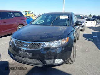 2012 Kia Forte SX with VIN KNAFW4A32C5623357, listed as a IAAI auction lot 41324098 with 217,354 mi miles. Bid and sale history available at carsss.com. Image 16.