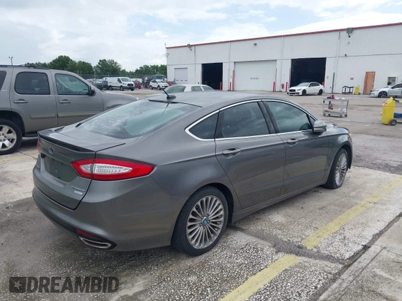 2013 Ford Fusion Titanium with VIN 3FA6P0K94DR192780, listed as a IAAI auction lot 42631746 with 88,994 mi miles and . Bid and sale history available at DreamBid. Image 4.