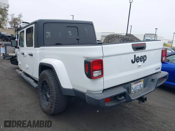 2020 Jeep Gladiator Sport S with VIN 1C6HJTAG9LL194454, listed as a IAAI auction lot 42430339 with 90,461 mi miles and . Bid and sale history available at DreamBid. Image 3.