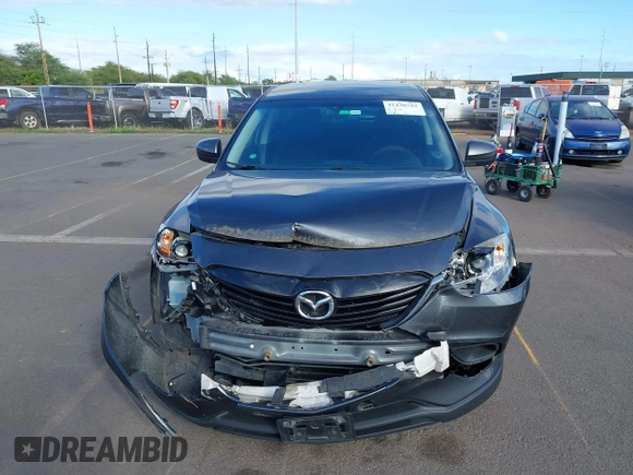2014 Mazda CX-9 Sport with VIN JM3TB3BAXE0442006, listed as a IAAI auction lot 41430742 with 82,682 mi miles and . Bid and sale history available at DreamBid. Image 12.