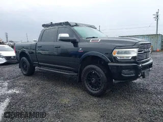 2019 Ram 2500 Laramie with VIN 3C6UR5FL7KG548833, listed as a IAAI auction lot 41557588 with 169,414 mi miles. Bid and sale history available at carsss.com. Image 1.