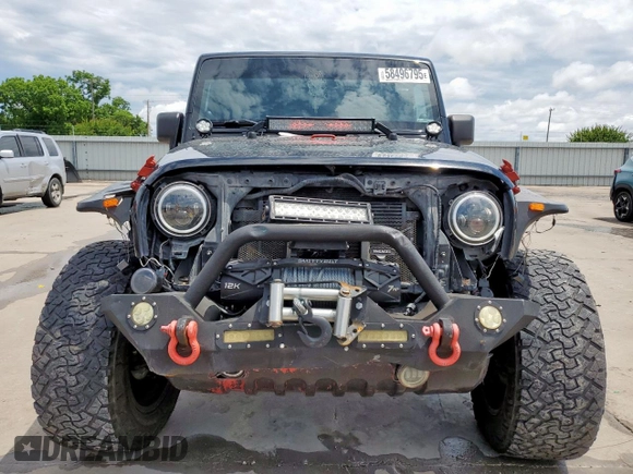 2014 Jeep Wrangler Unlimited Rubicon с VIN 1C4HJWFG1EL156853, выставлен на аукционе Copart как лот 58496795 с пробегом 112 073 миль миль и Списание • Salvage title. История ставок и продаж доступна на DreamBid. Изображение 5.