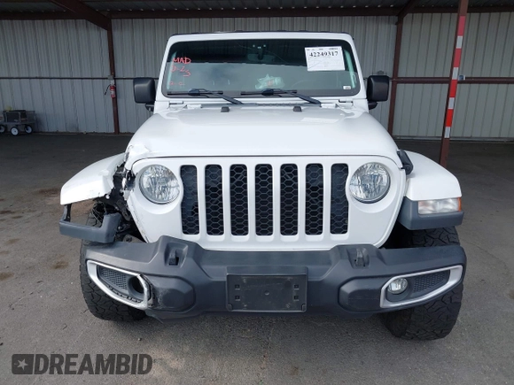 2021 Jeep Gladiator Willys with VIN 1C6HJTAG0ML505674, listed as a IAAI auction lot 42249317 with 60,150 mi miles and . Bid and sale history available at DreamBid. Image 12.