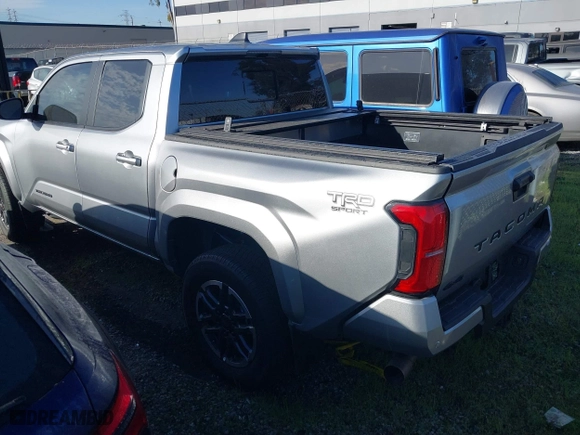2024 Toyota Tacoma 4WD SR5 with VIN 3TMLB5JN4RM021667, listed as a IAAI auction lot 41343801 with 5,037 mi miles. Bid and sale history available at carsss.com. Image 3.