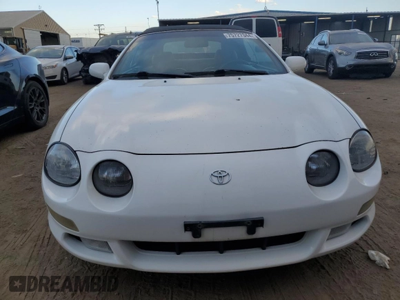 1998 Toyota Celica GT z VIN JT5FG02T2W0047564, wystawiony jako Copart lot #75727344 z przebiegiem 225 802 mil mil oraz Szkoda całkowita • Salvage title. Historia ofert i sprzedaży dostępna na DreamBid. Obrazek 5.