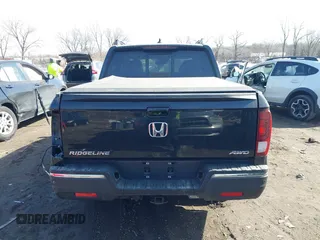 2019 Honda Ridgeline RTL-E with VIN 5FPYK3F7XKB014406, listed as a IAAI auction lot 41765154 with 65,209 mi miles and . Bid and sale history available at DreamBid. Image 17.