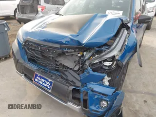 2024 Subaru Forester Wilderness with VIN JF2SKAJC4RH516833, listed as a IAAI auction lot 42115006 with 23,676 mi miles and . Bid and sale history available at DreamBid. Image 6.
