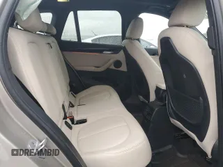 2021 BMW X1 xDrive28i z VIN WBXJG9C03M5U47126, wystawiony jako Copart lot #52113955 z przebiegiem 69 284 mil mil oraz Szkody całkowita. Historia ofert i sprzedaży dostępna na DreamBid. Obrazek 11.