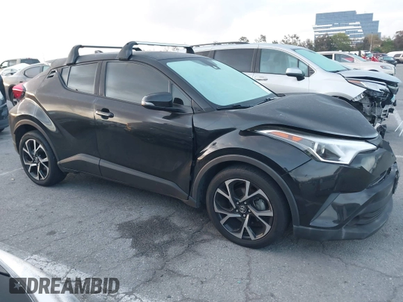 2019 Toyota C-HR XLE with VIN JTNKHMBXXK1034717, listed as a IAAI auction lot 41939078 with 56,309 mi miles. Bid and sale history available at carsss.com. Image 14.