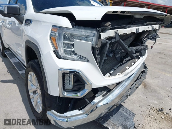 2019 GMC Sierra 1500 SLT z VIN 3GTP8DED7KG268973, wystawiony jako IAAI lot #42224064 z przebiegiem 98 871 mil mil oraz . Historia ofert i sprzedaży dostępna na DreamBid. Obrazek 19.