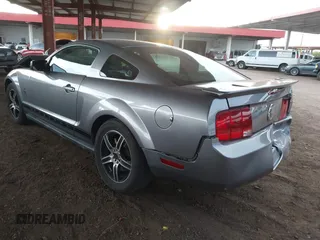 2007 Ford Mustang Deluxe with VIN 1ZVHT80N775234974, listed as a IAAI auction lot 42029377 with 227,856 mi miles. Bid and sale history available at carsss.com. Image 3.
