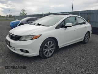 2012 Honda Civic Si with VIN 2HGFB6E54CH200764, listed as a Copart auction lot 64190875 with 129,720 mi miles and Clean title. Bid and sale history available at DreamBid. Image 1.