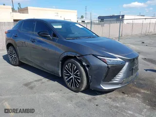 2023 Lexus RZ with VIN JTJAAAAB5PA011228, listed as a IAAI auction lot 41550311 with 6,984 mi miles. Bid and sale history available at carsss.com. Image 1.