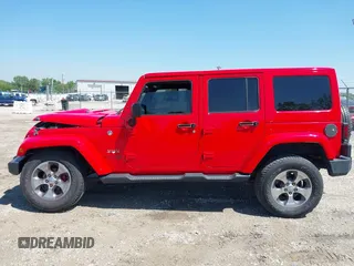 2018 Jeep Wrangler Unlimited Sahara z VIN 1C4HJWEG6JL893798, wystawiony jako IAAI lot #42299351 z przebiegiem Nie podano mil oraz . Historia ofert i sprzedaży dostępna na DreamBid. Obrazek 14.