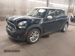 2014 MINI Countryman S with VIN WMWZC5C56EWP38017, listed as a IAAI auction lot 42287308 with 151,780 mi miles and . Bid and sale history available at DreamBid. Image 2.