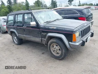 1992 Jeep Cherokee z VIN 1J4FJ58S1NL235291, wystawiony jako IAAI lot #42551647 z przebiegiem 244 104 mil mil oraz . Historia ofert i sprzedaży dostępna na DreamBid. Obrazek 1.