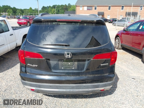 2017 Honda Pilot Touring with VIN 5FNYF5H91HB038268, listed as a IAAI auction lot 42786448 with 62,195 mi miles and . Bid and sale history available at DreamBid. Image 17.