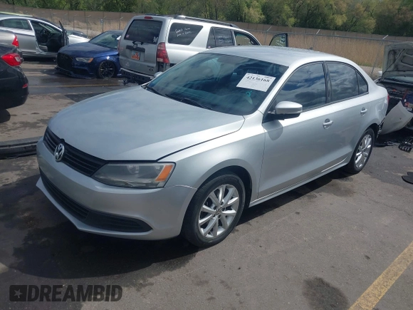 2011 Volkswagen Jetta SE z VIN 3VWDZ7AJ7BM340220, wystawiony jako IAAI lot #42136168 z przebiegiem 147 864 mil mil oraz . Historia ofert i sprzedaży dostępna na DreamBid. Obrazek 18.