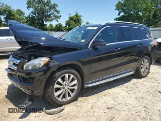 2015 Mercedes-Benz GL-Class GL 450 with VIN 4JGDF6EE1FA562088, listed as a Copart auction lot 58736934 with 104,550 mi miles and Salvage Title. Bid and sale history available at carsss.com. Image 1.