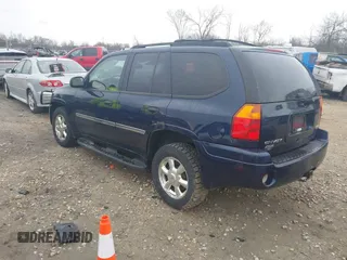 2007 GMC Envoy SLE with VIN 1GKDT13S372158038, listed as a IAAI auction lot 42103078 with 119,954 mi miles. Bid and sale history available at carsss.com. Image 3.