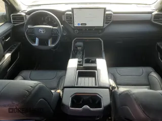 2023 Toyota Tundra Limited Hybrid with VIN 5TFJC5DBXPX022822, listed as a Copart auction lot 77610044 with 32,908 mi miles and Salvage title. Bid and sale history available at DreamBid. Image 8.
