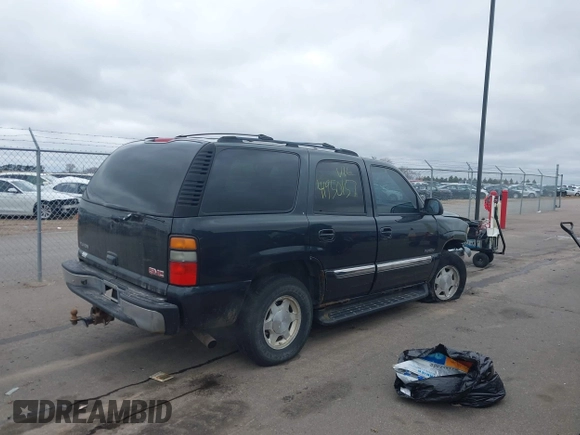 2004 GMC Yukon SLT with VIN 1GKEK13Z24J113954, listed as a IAAI auction lot 41950157 with 174,021 mi miles. Bid and sale history available at carsss.com. Image 4.