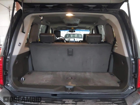 2004 Infiniti QX56 with VIN 5N3AA08C14N812225, listed as a IAAI auction lot 41496326 with 213,916 mi miles. Bid and sale history available at carsss.com. Image 12.