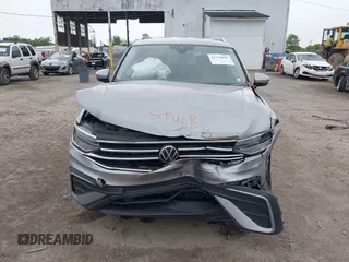 2023 Volkswagen Tiguan SE with VIN 3VV3B7AX1PM137324, listed as a IAAI auction lot 42378045 with 35,187 mi miles and . Bid and sale history available at DreamBid. Image 6.