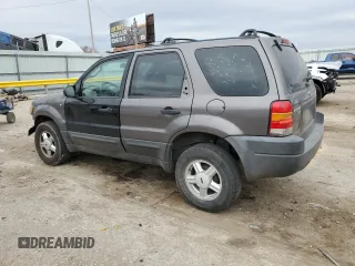 2002 Ford Escape XLS Choice with VIN 1FMYU02102KB67376, listed as a Copart auction lot 79109394 with 234,306 mi miles and Salvage title. Bid and sale history available at DreamBid. Image 2.