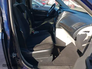 2012 Dodge Grand Caravan SE with VIN 2C4RDGBG3CR235940, listed as a IAAI auction lot 41322892 with 146,789 mi miles. Bid and sale history available at carsss.com. Image 5.
