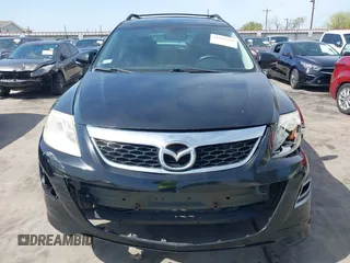 2011 Mazda CX-9 Grand Touring with VIN JM3TB3DA5B0300784, listed as a IAAI auction lot 41816110 with 138,523 mi miles and . Bid and sale history available at DreamBid. Image 13.
