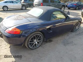 2001 Porsche Boxster with VIN WP0CA29841U626899, listed as a IAAI auction lot 41695245 with 138,097 mi miles. Bid and sale history available at carsss.com. Image 4.