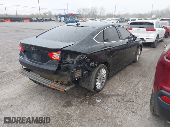 2016 Ford Fusion Energi SE Luxury with VIN 3FA6P0PU2GR322430, listed as a IAAI auction lot 42038508 with 114,980 mi miles. Bid and sale history available at carsss.com. Image 4.