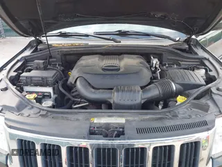 2011 Jeep Grand Cherokee 70th Anniversary with VIN 1J4RR4GG3BC631831, listed as a IAAI auction lot 42038415 with 130,811 mi miles. Bid and sale history available at carsss.com. Image 10.