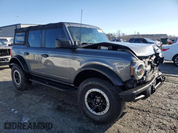 2021 Ford Bronco with VIN 1FMEE5DP9MLA89837, listed as a Copart auction lot 87672995 with 27,341 mi miles and Salvage Title. Bid and sale history available at DreamBid. Image 4.