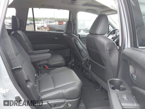 2022 Honda Pilot Touring 7-Passenger with VIN 5FNYF6H68NB056077, listed as a IAAI auction lot 42357338 with 18,193 mi miles and . Bid and sale history available at DreamBid. Image 8.
