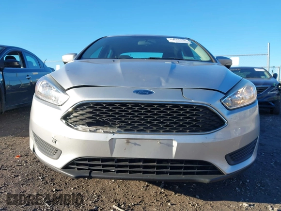2017 Ford Focus SE with VIN 1FADP3F27HL321914, listed as a IAAI auction lot 40821776 with 87,689 mi miles and . Bid and sale history available at DreamBid. Image 13.