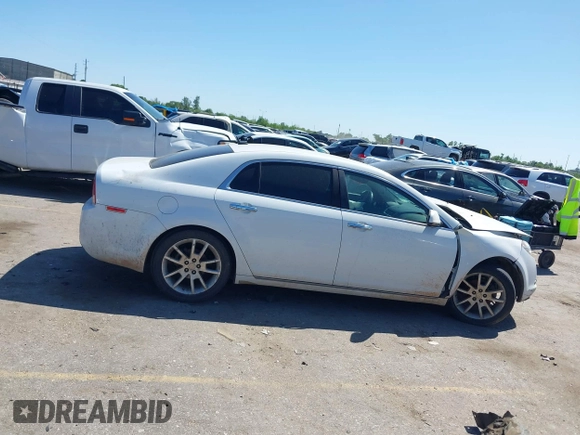 2011 Chevrolet Malibu LTZ with VIN 1G1ZE5EU3BF368263, listed as a IAAI auction lot 41937180 with 300,164 mi miles and . Bid and sale history available at DreamBid. Image 13.