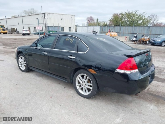 2013 Chevrolet Impala LTZ with VIN 2G1WC5E33D1129273, listed as a IAAI auction lot 42086191 with 206,340 mi miles. Bid and sale history available at carsss.com. Image 3.
