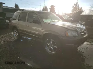 2001 Mazda Tribute LX with VIN 4F2CU08141KM64641, listed as a Copart auction lot 78269324 with 175,438 mi miles and Salvage Title. Bid and sale history available at DreamBid. Image 4.